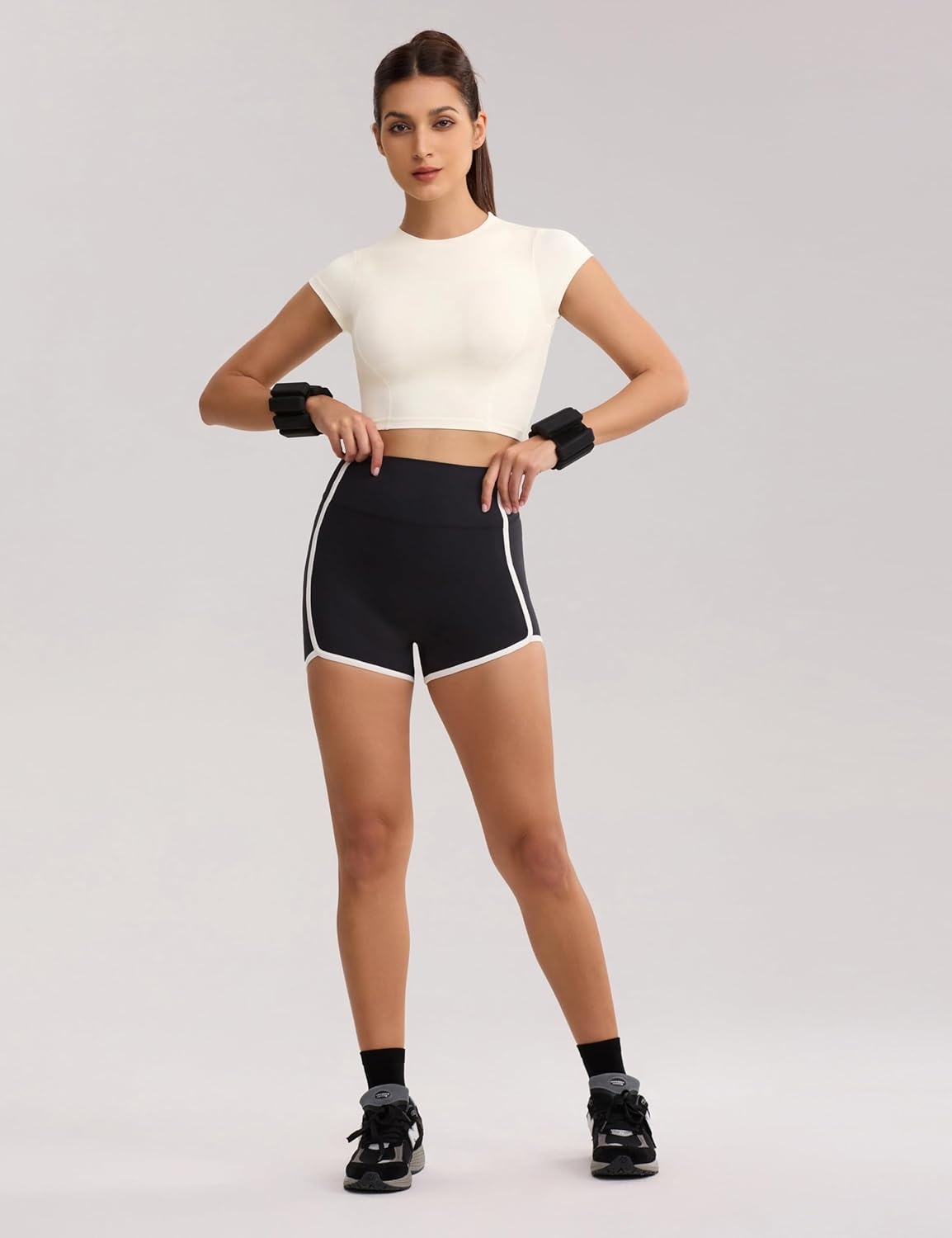 image:imageENERBLOOM Workout Crop Tops for Women Yoga Short Sleeve Mild Support Slim Fit Cropped Athletic Shirts Gym Tee Built in BraCreamy White