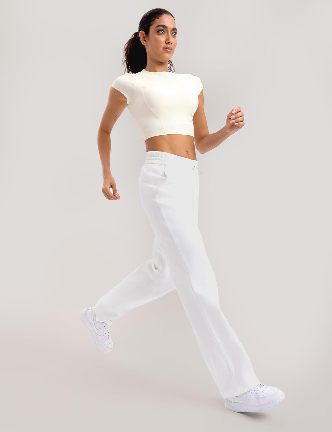 image:imageENERBLOOM Workout Crop Tops for Women Yoga Short Sleeve Mild Support Slim Fit Cropped Athletic Shirts Gym Tee Built in BraCreamy White